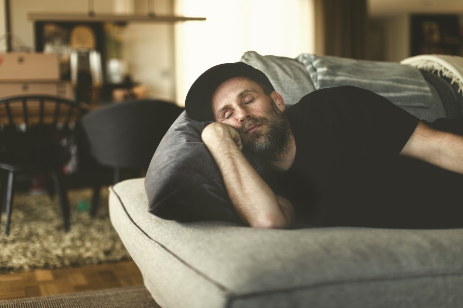 Man sleeping on couch