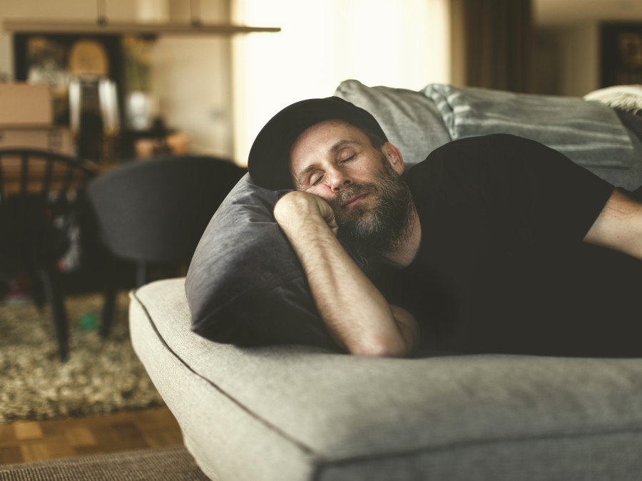 Man sleeping on couch