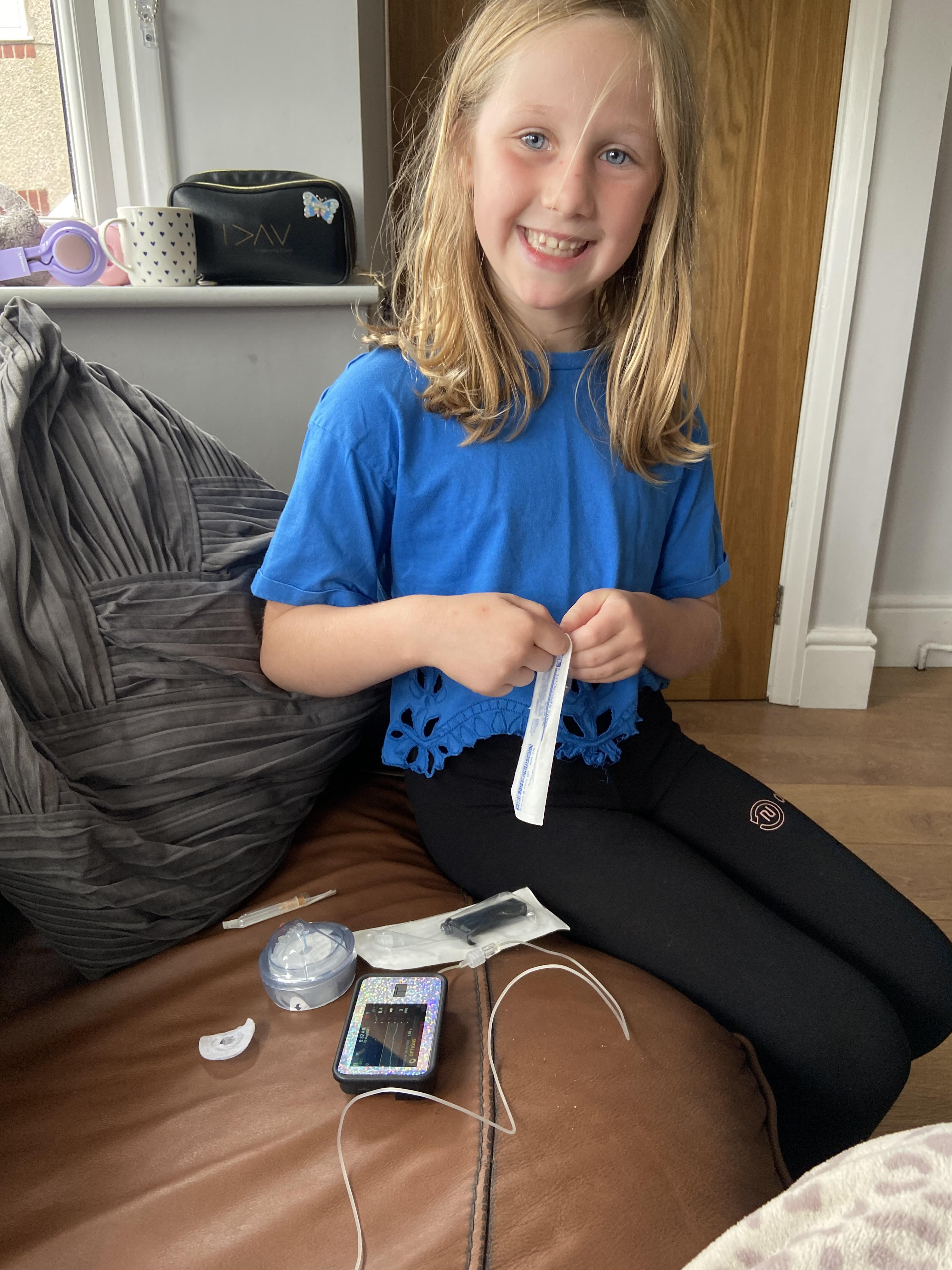 Isabella doing a set change