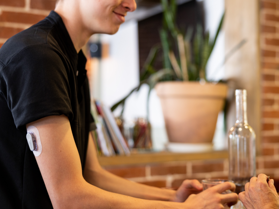 Young boy with dexcom on arm