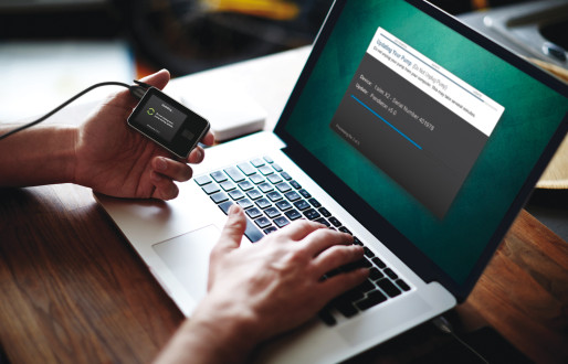 The t:slim X2 being updated by USB connection to a laptop