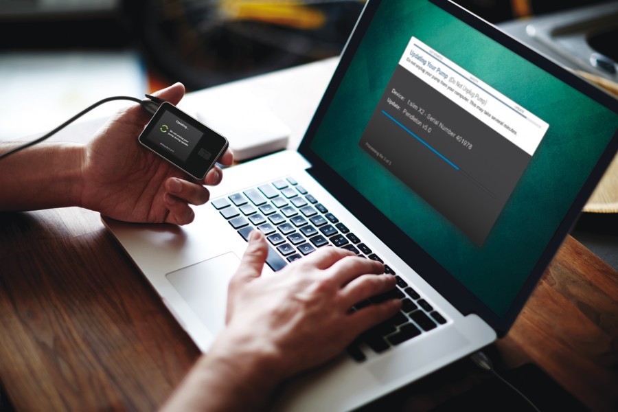 The t:slim X2 being updated by USB connection to a laptop