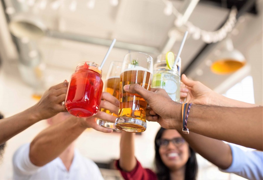 Friends toasting with drinks