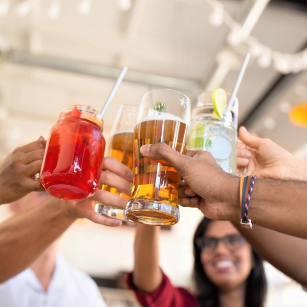 Friends toasting with drinks